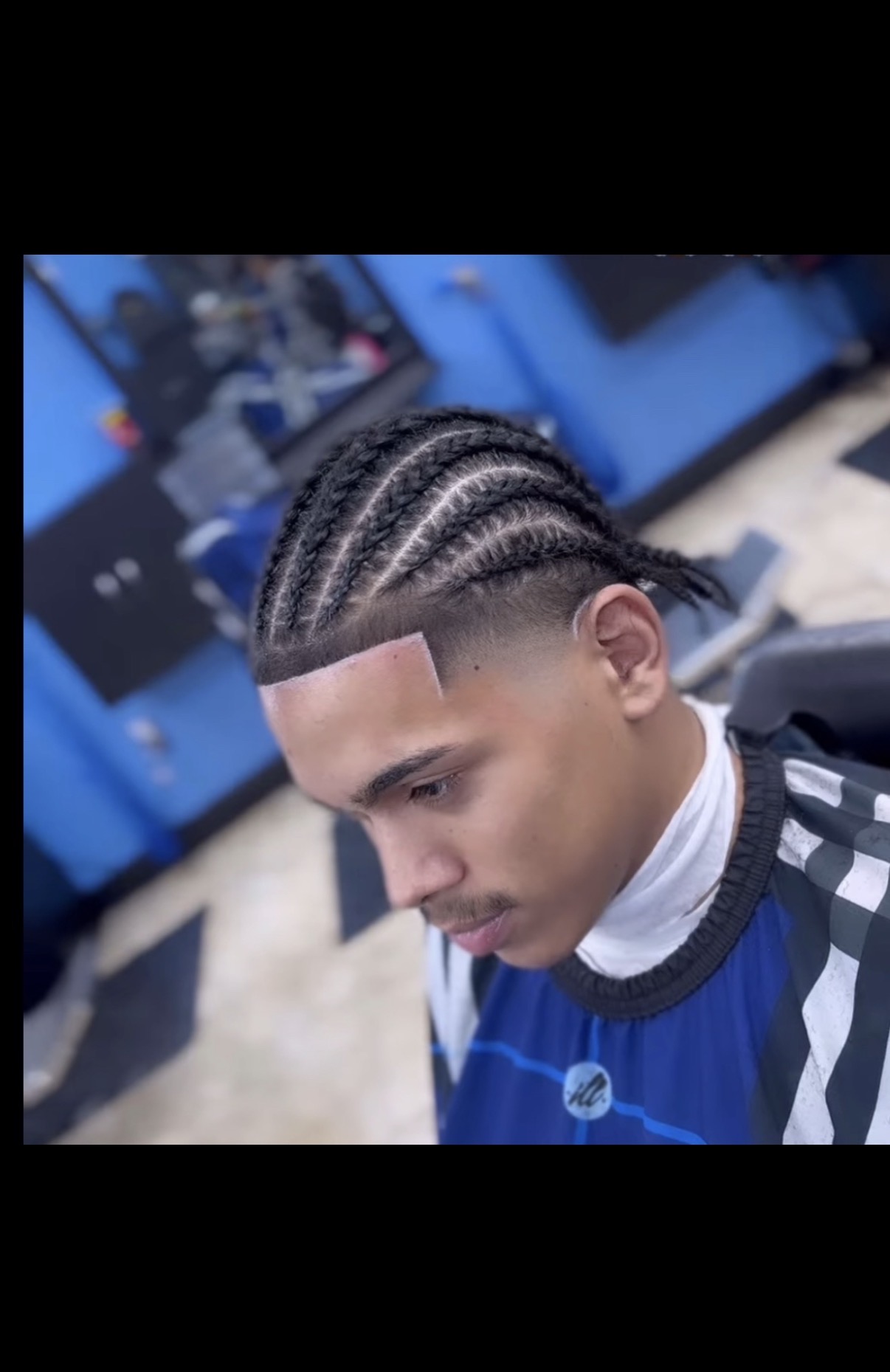 Cornrows with crisp skin fade